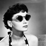 Audrey Hepburn with sunglasses.